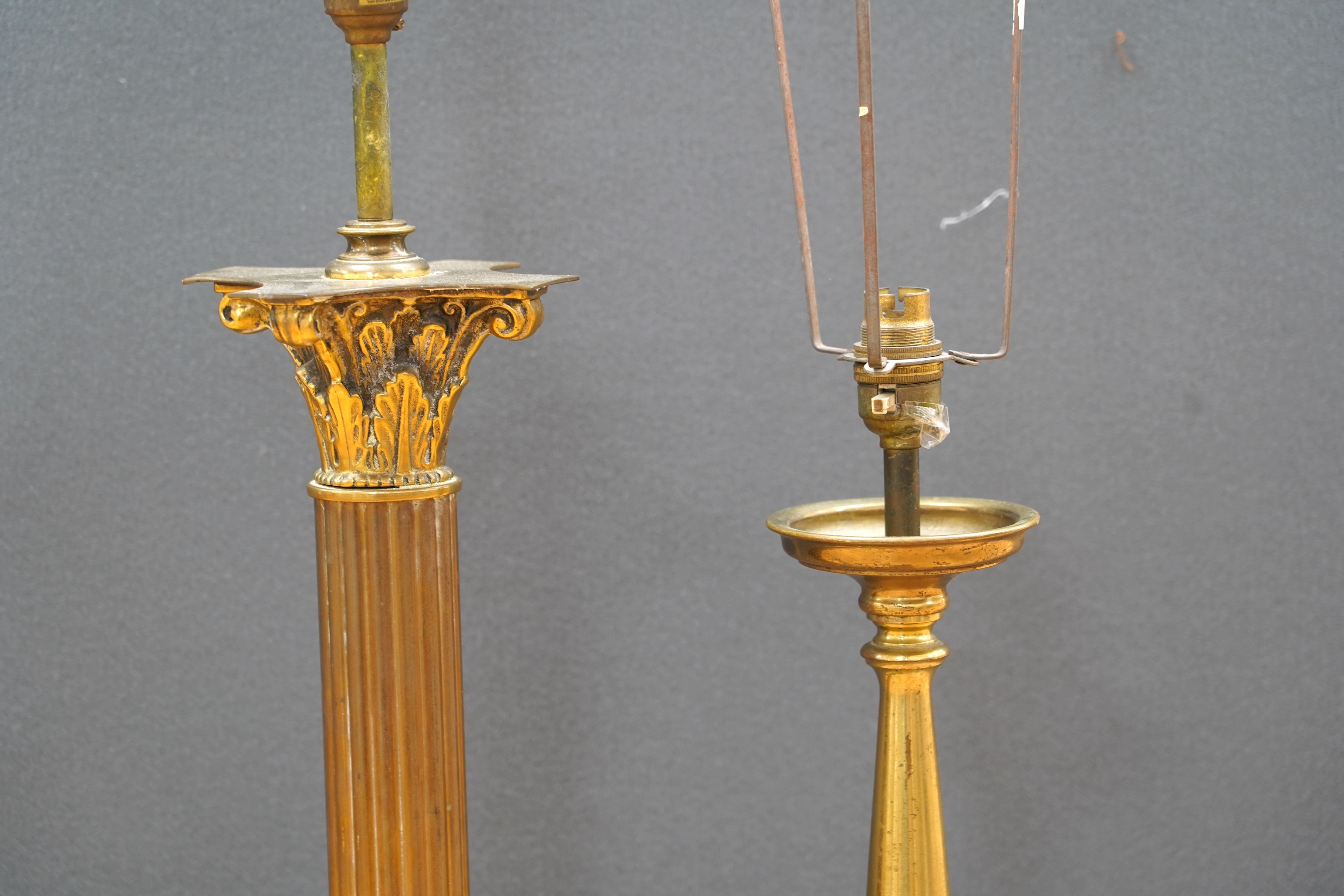 A large brass Corinthian column table lamp and another, largest 60cm excluding light fittings